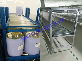 Băng tải con lăn phẳng vận chuyển thùng sơn